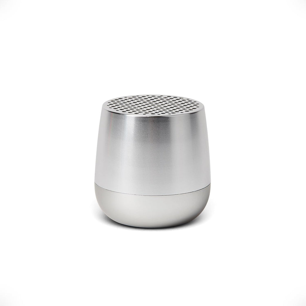 Mini enceinte Bluetooth design galet aluminium — recharge Qi/USB-C, TWS stéréo, micro mains-libres